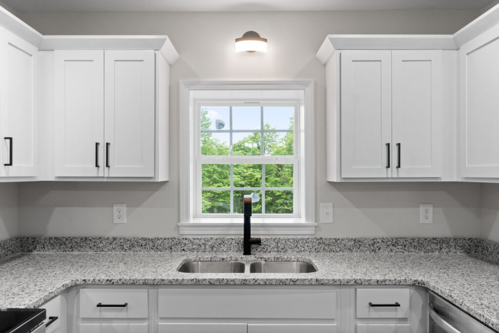 White shaker cabinet with a single window